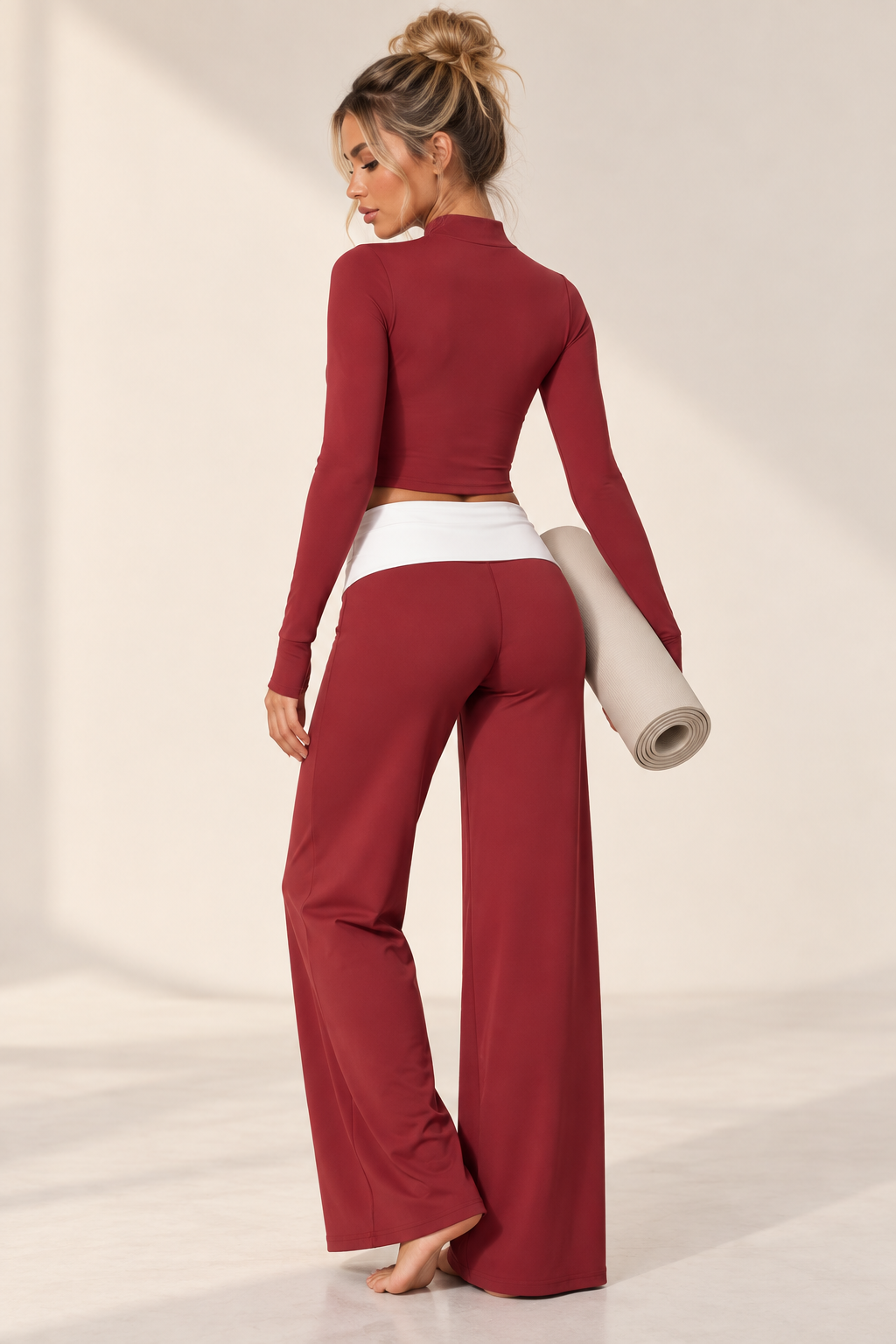 Dark cherry women’s Pilates three piece featuring a sleek cropped performance jacket, matching training bra and fluid wide leg lounge pants